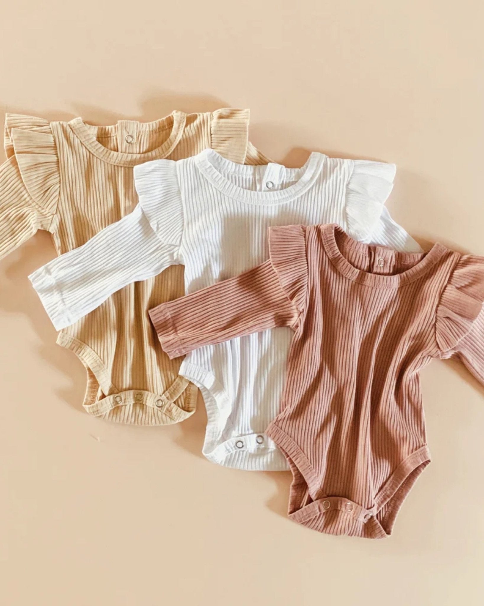 Ribbed Flutter Bodysuit | Pink